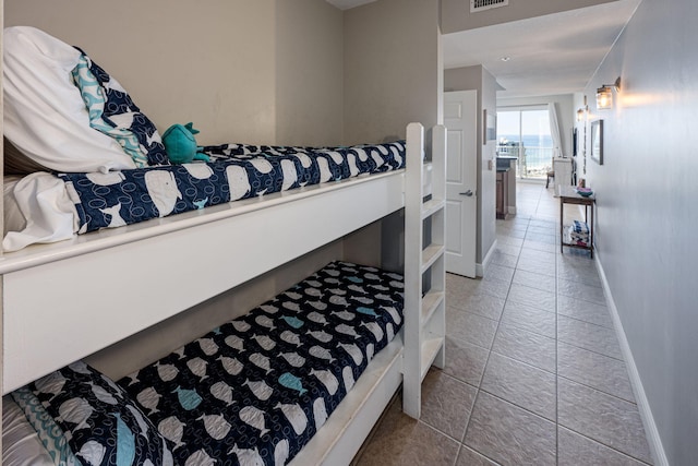 bedroom featuring tile patterned floors