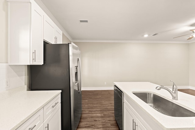 kitchen with white cabinetry, sink, dark wood-type flooring, and stainless steel appliances