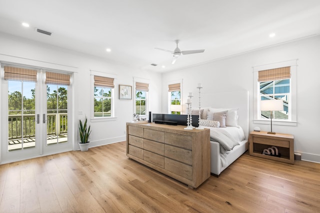 bedroom featuring light hardwood / wood-style floors, crown molding, access to exterior, and ceiling fan