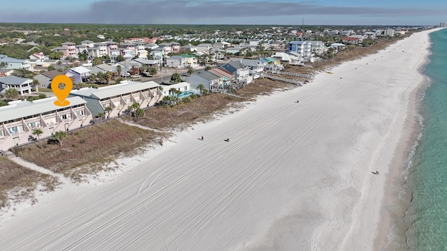 aerial view featuring a water view and a beach view