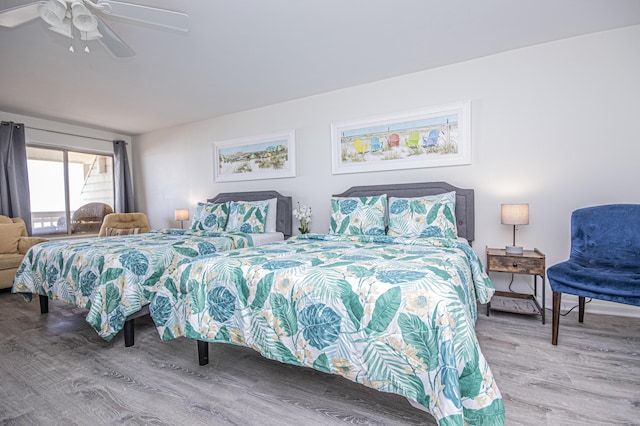 bedroom featuring light wood-type flooring and ceiling fan