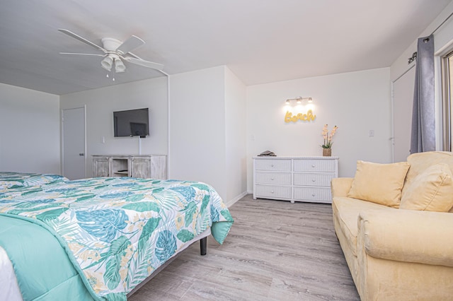 bedroom featuring ceiling fan and light wood-type flooring