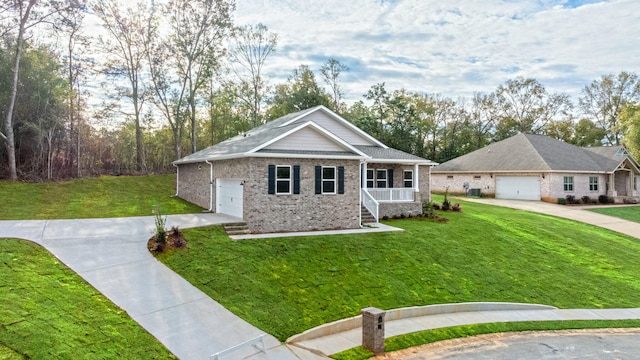 view of front facade with covered porch, a front lawn, and a garage