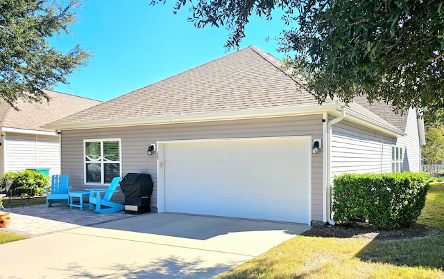 view of home's exterior with a garage