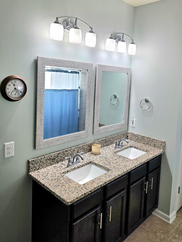 bathroom with vanity and tile patterned flooring