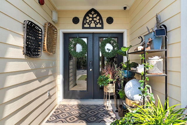 entrance to property featuring french doors