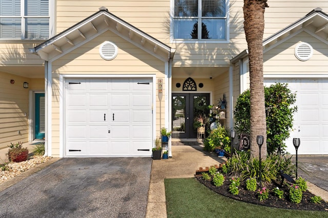doorway to property with french doors and driveway