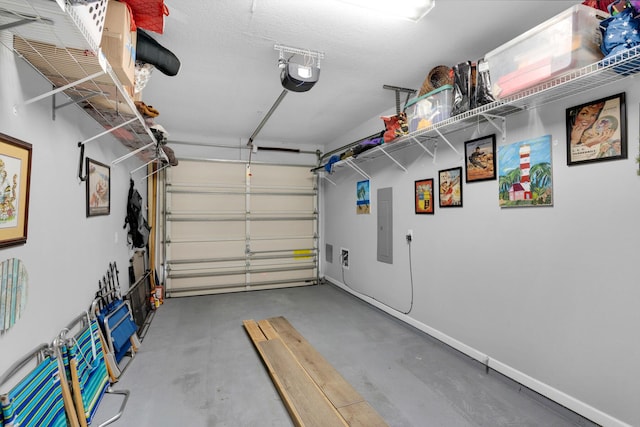 garage with a garage door opener and electric panel