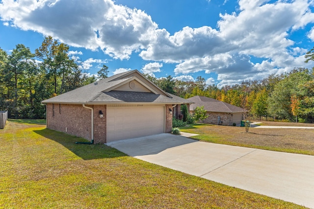 single story home featuring a front yard and a garage