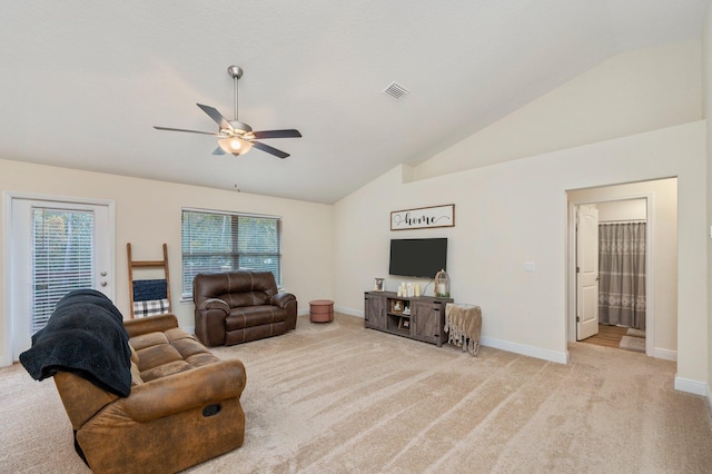 living area featuring visible vents, lofted ceiling, baseboards, a ceiling fan, and carpet