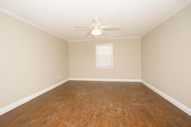 spare room with dark hardwood / wood-style flooring, ceiling fan, and crown molding