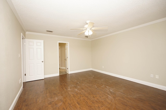 spare room with crown molding, ceiling fan, dark wood-type flooring, and a textured ceiling