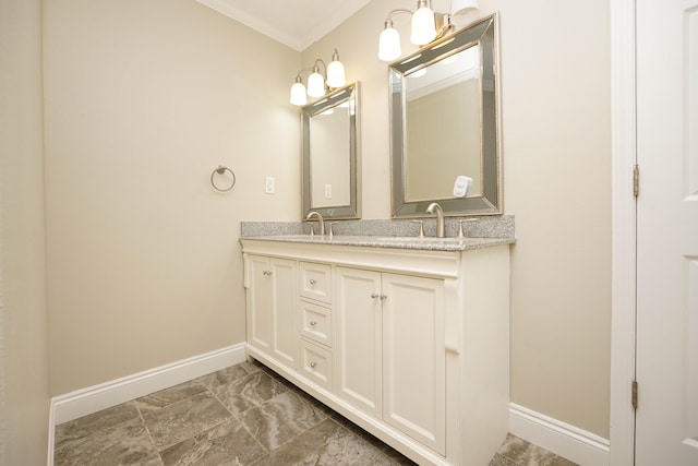 bathroom with vanity and crown molding