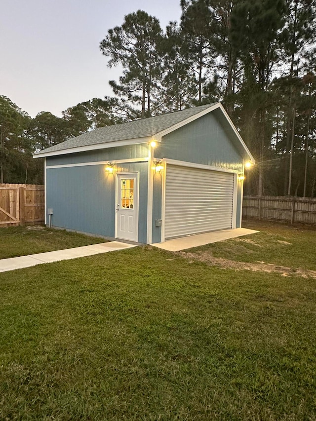 garage with a lawn