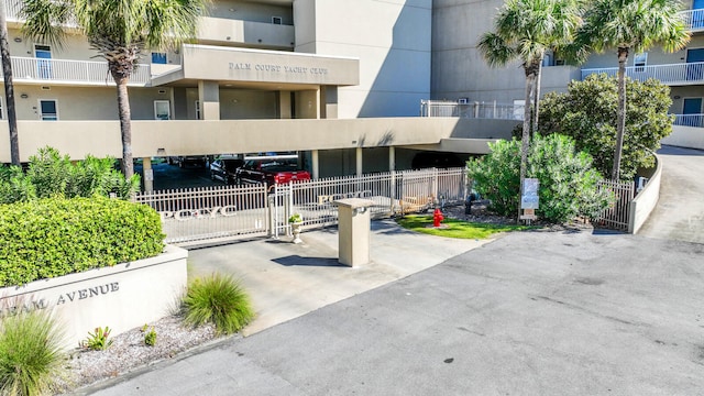 view of building exterior featuring a carport