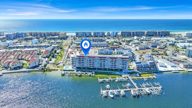 birds eye view of property featuring a water view