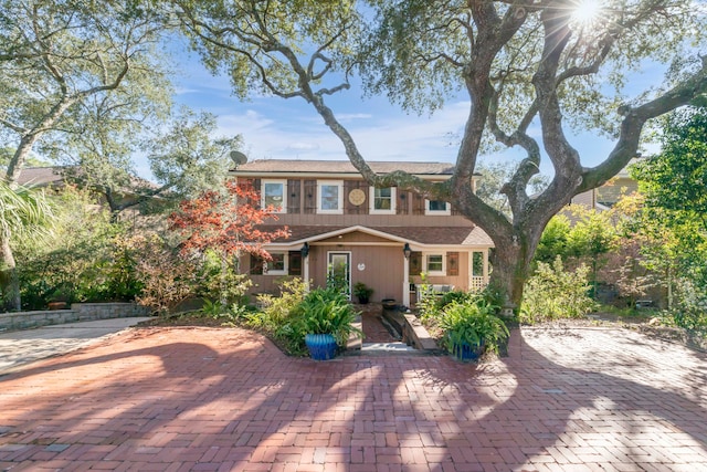 view of front of property featuring a patio