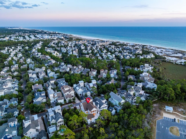 bird's eye view featuring a residential view and a water view