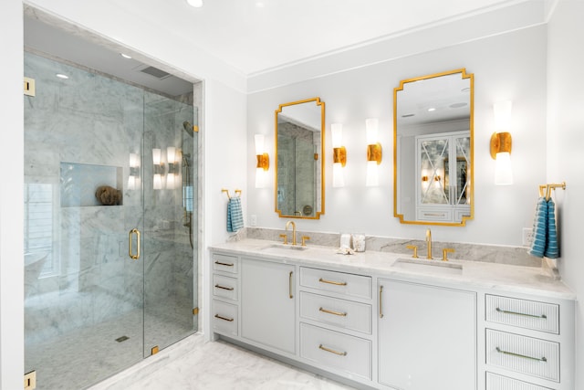 full bath featuring a sink, a marble finish shower, marble finish floor, and double vanity