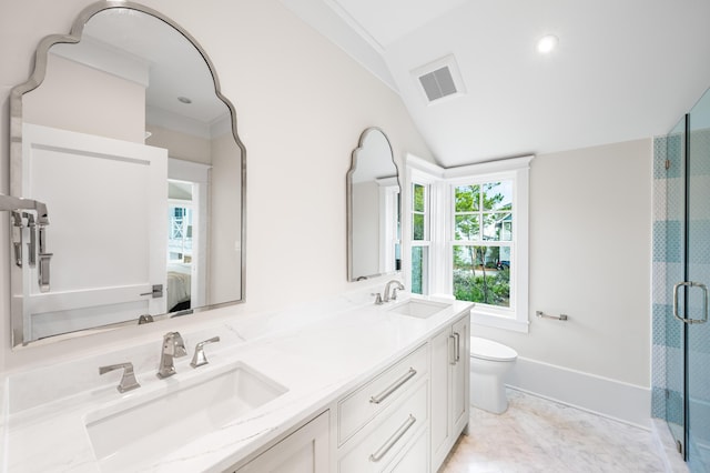 bathroom with toilet, visible vents, connected bathroom, and a sink