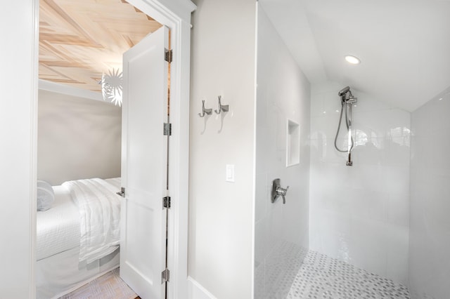 full bathroom featuring tiled shower and ensuite bath