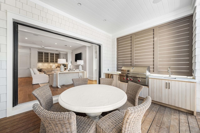 dining space featuring light wood-type flooring and ceiling fan