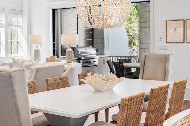 dining space featuring a notable chandelier