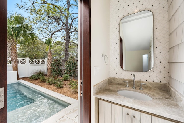 bathroom featuring vanity and a wealth of natural light