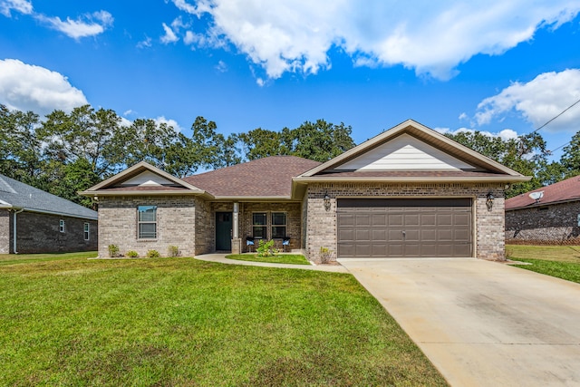 view of front of house featuring a front yard and a garage