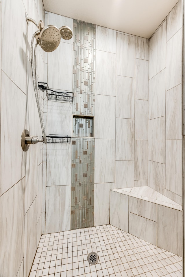 bathroom featuring tiled shower