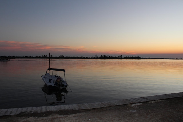 water view featuring a dock