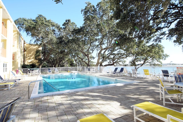 view of swimming pool featuring a patio