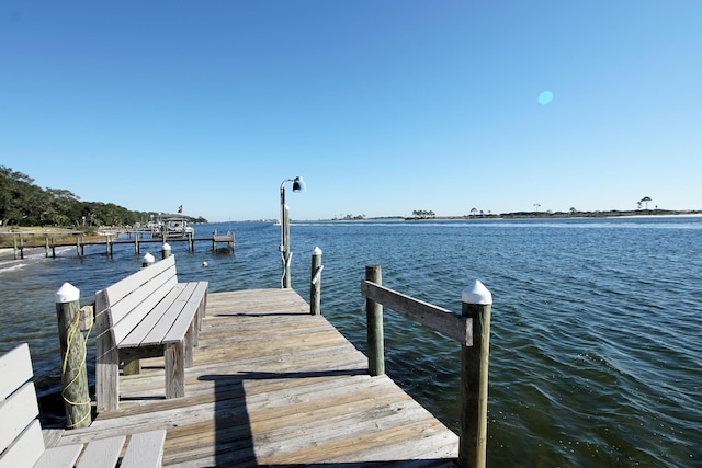 209 W Miracle Strip Pkwy Apt A104, Mary Esther, FL 32569 - dock area featuring a water view