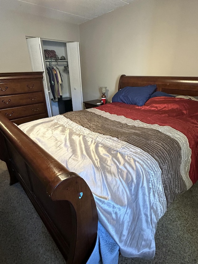 carpeted bedroom with a closet