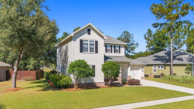 front facade with a front yard and a garage