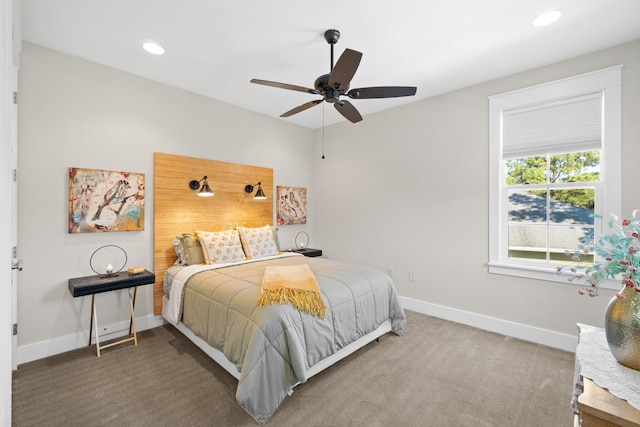 carpeted bedroom featuring ceiling fan