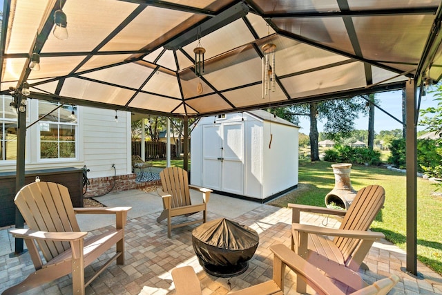 view of patio with a storage shed