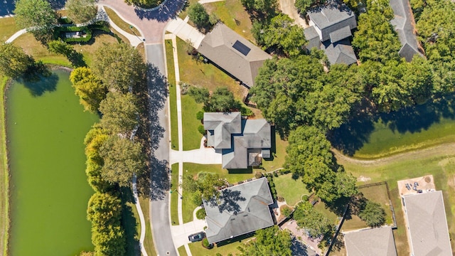 bird's eye view with a water view