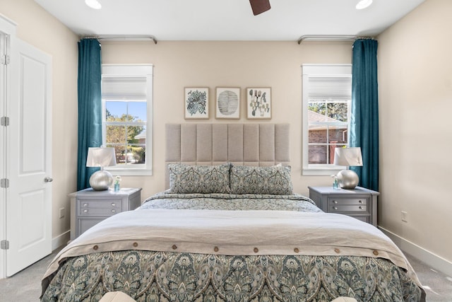 carpeted bedroom featuring ceiling fan