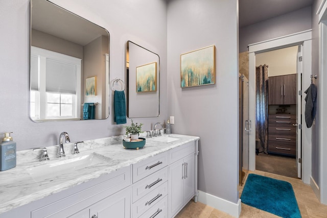 bathroom with vanity and tile patterned floors