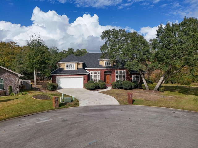 view of front facade featuring a front yard and a garage