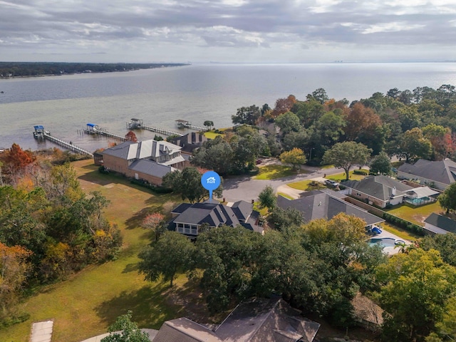 birds eye view of property featuring a water view