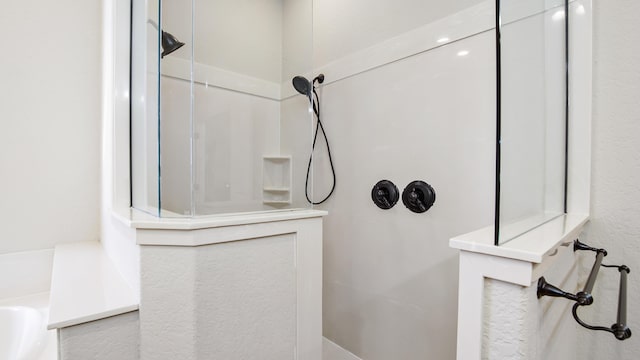 bathroom with walk in shower