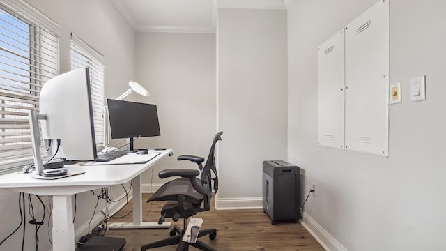 home office with ornamental molding and dark wood-type flooring