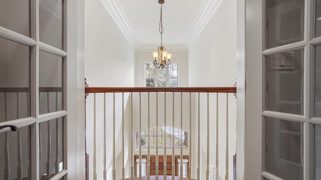 room details with crown molding and a chandelier