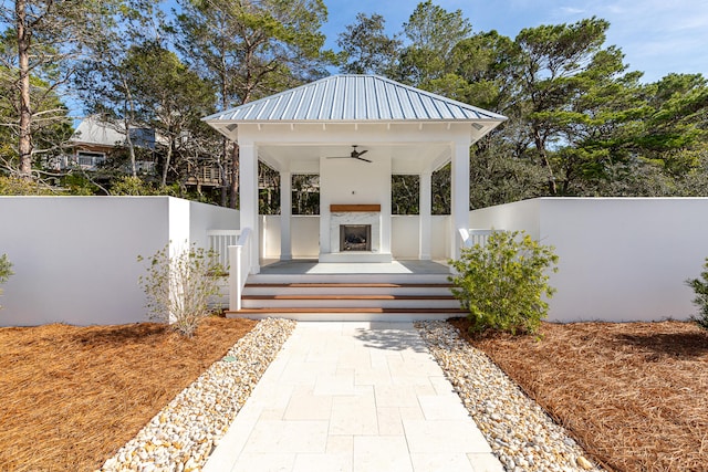 view of patio / terrace featuring ceiling fan