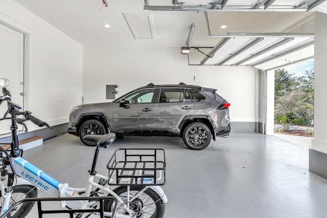 garage featuring a garage door opener