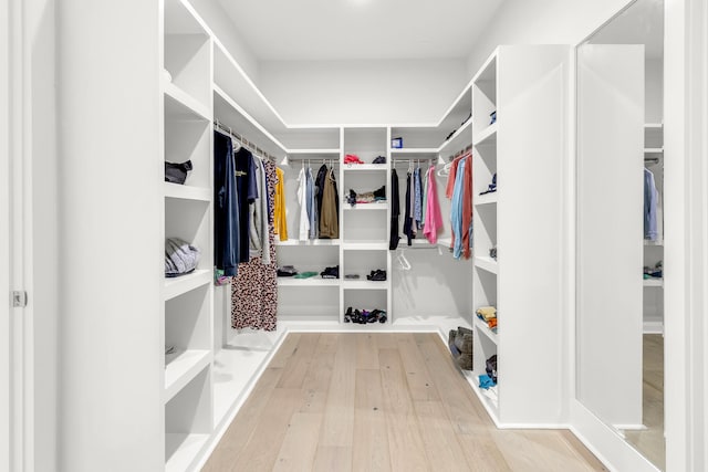 walk in closet featuring light wood-type flooring