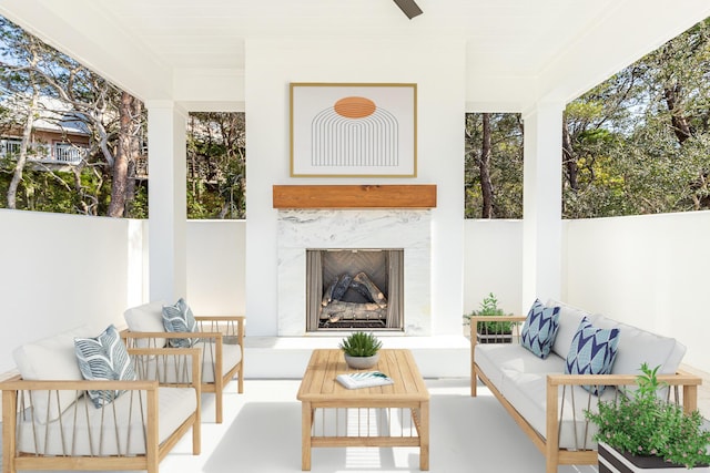 sunroom with a premium fireplace