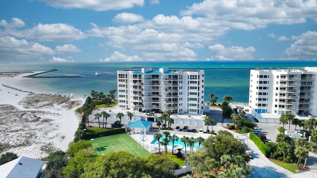 birds eye view of property with a water view